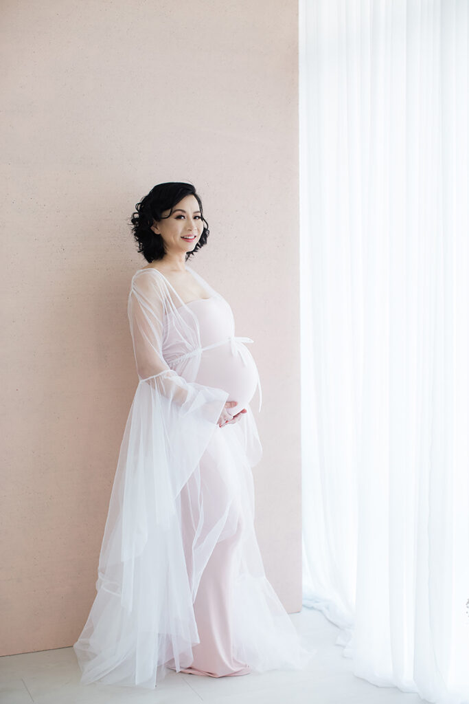 Embrace the beauty of your pregnancy with our glamorous maternity boudoir shoot in Vancouver. Our experienced photographer captures the elegance and sensuality of your maternity journey, creating stunning portraits that celebrate your motherhood in style. Indulge in a personalized and intimate photography experience that empowers you to embrace your pregnancy glow. Contact us now to book your unforgettable glamour maternity boudoir shoot.