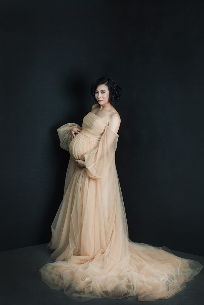 Embrace the beauty of your pregnancy with our glamorous maternity boudoir shoot in Vancouver. Our experienced photographer captures the elegance and sensuality of your maternity journey, creating stunning portraits that celebrate your motherhood in style. Indulge in a personalized and intimate photography experience that empowers you to embrace your pregnancy glow. Contact us now to book your unforgettable glamour maternity boudoir shoot.