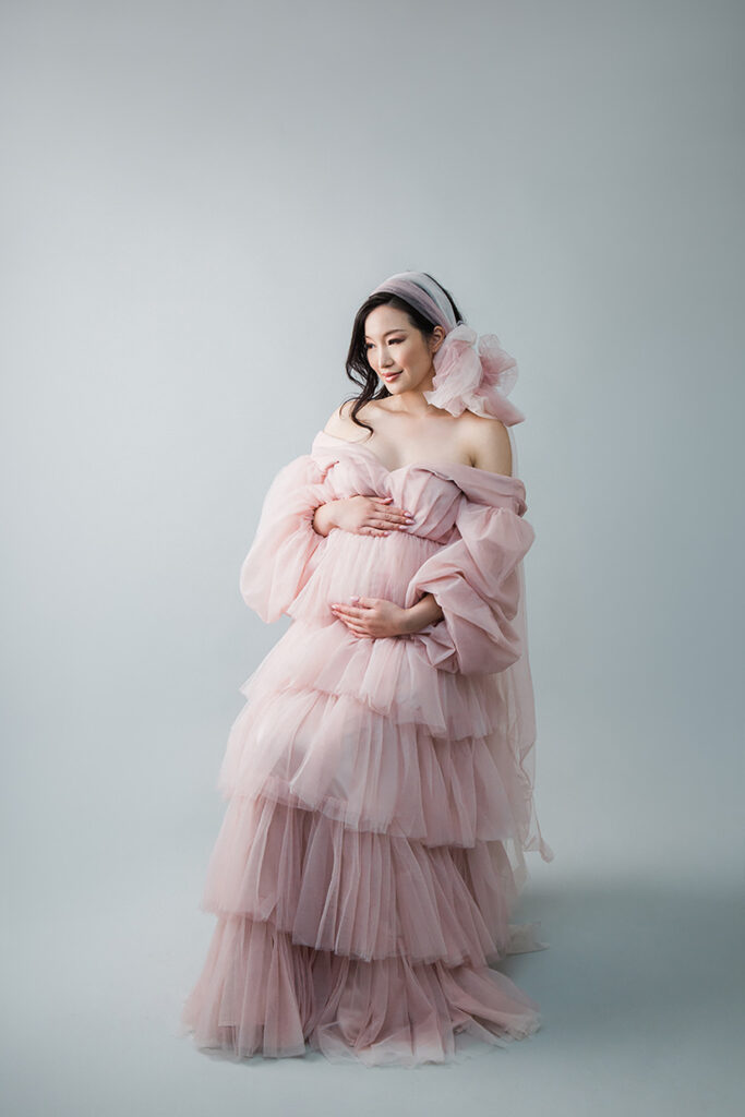 Embrace the beauty of your pregnancy with our glamorous maternity boudoir shoot in Vancouver. Our experienced photographer captures the elegance and sensuality of your maternity journey, creating stunning portraits that celebrate your motherhood in style. Indulge in a personalized and intimate photography experience that empowers you to embrace your pregnancy glow. Contact us now to book your unforgettable glamour maternity boudoir shoot.