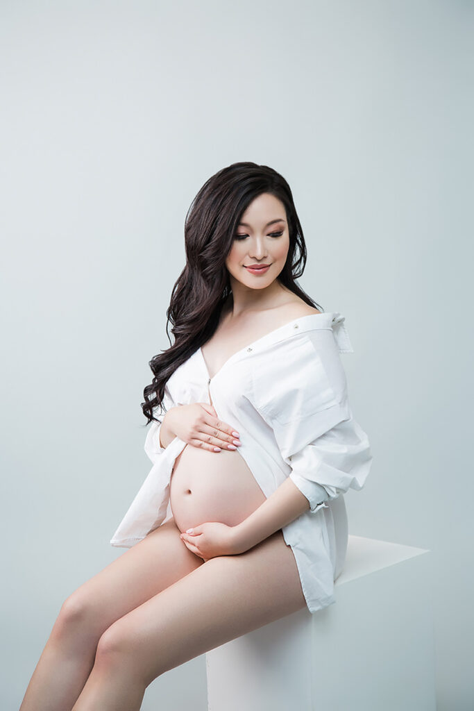 Embrace the beauty of your pregnancy with our glamorous maternity boudoir shoot in Vancouver. Our experienced photographer captures the elegance and sensuality of your maternity journey, creating stunning portraits that celebrate your motherhood in style. Indulge in a personalized and intimate photography experience that empowers you to embrace your pregnancy glow. Contact us now to book your unforgettable glamour maternity boudoir shoot.